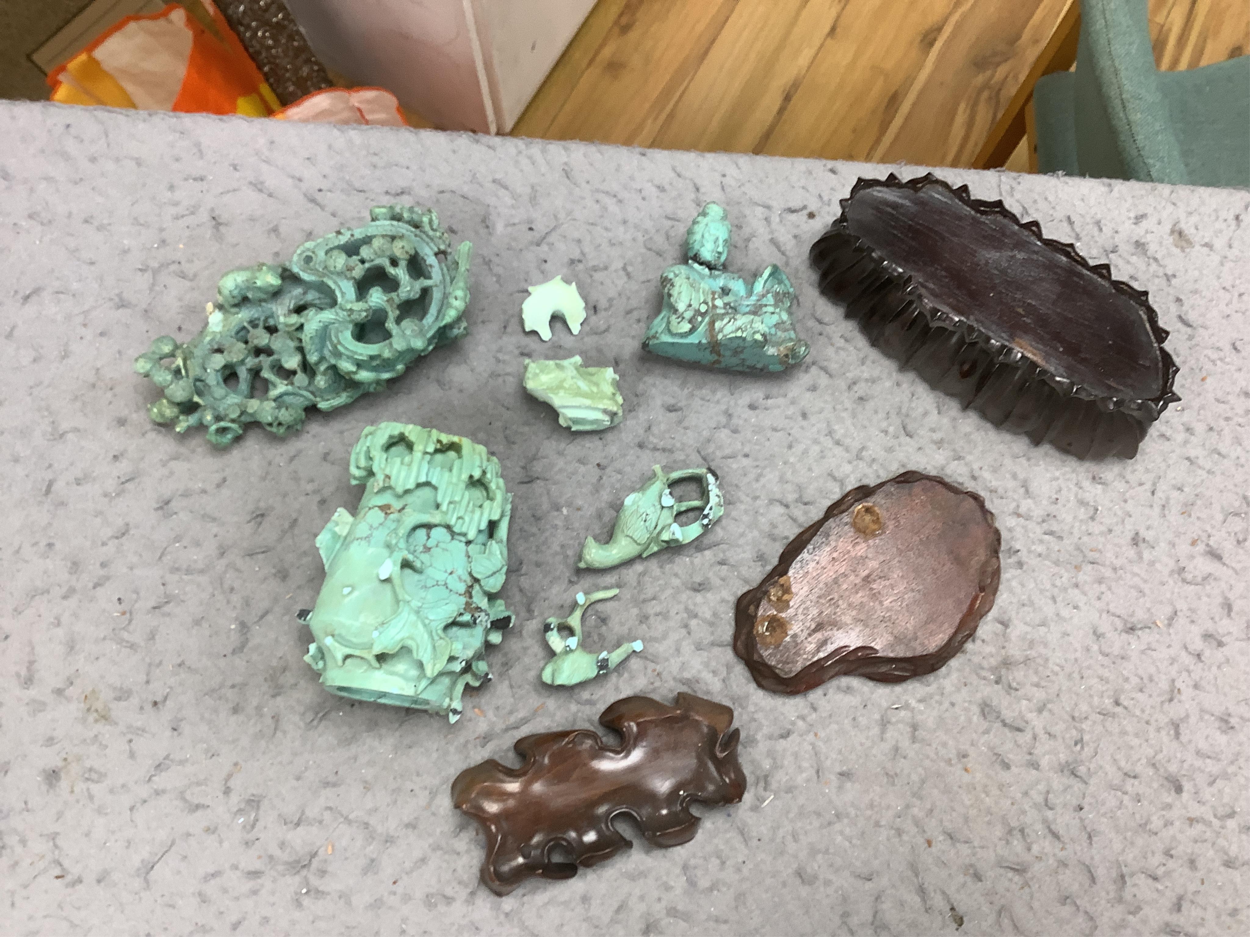 A group of Chinese turquoise matrix carvings, comprising a boy on a buffalo, 5.5in. a brushwasher, 7in. a vase and cover, 6.5in. a snuff bottle and a figure of a woman, 4.5in. (all a.f.)